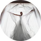 Image of back of bride at window